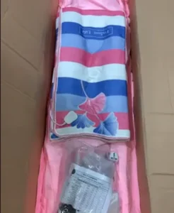 ตุ๊กตายางถูกคลุมด้วยผ้าสีชมพู